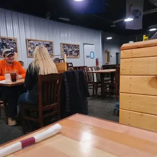 Inside the restaurant, waiting for our food.