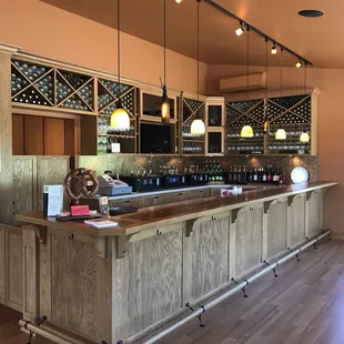 Classy tasting bar where you can try 3 for FREE or 7 for $10, or buy a glass or wine.