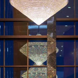 Swarovski STRASS-trimmed crystal chandeliers adorn the Grand Lobby at Armstrong Auditorium in Edmond, Okla.