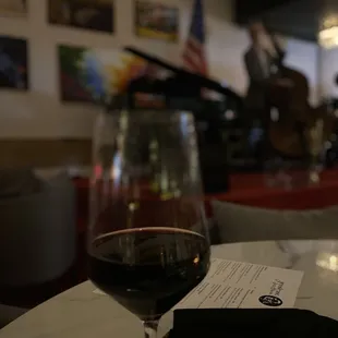 a glass of wine on a table