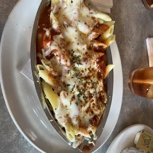 a plate of pasta with cheese