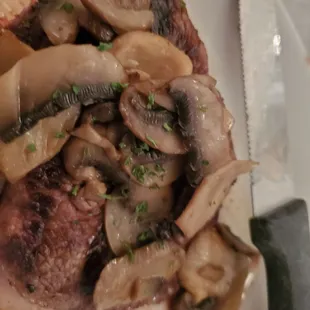 Delmonics steak with mushrooms