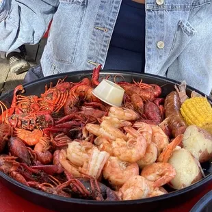 Shrimp, Crawfish, Sausage, potatoes, corn with butter.