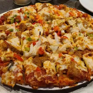 10" Rustica Pizza with additional artichokes and provolone was delicious.