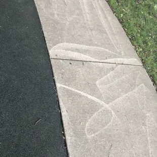 Poorly power washed sidewalks.