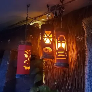 two lanterns hanging from the ceiling