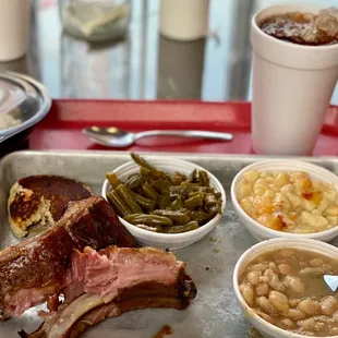 Ribs, green beans, white beans, Mac n cheese, banana pudding