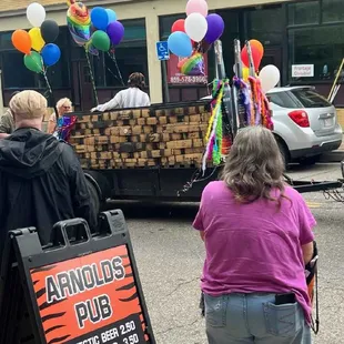 Arnold's Pub Pride parade covington northern kentucky bar happy hour drinks fun community neighborhood pub events games