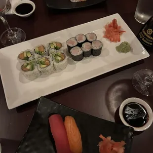 Yellowtail &amp; scallion roll, salmon avocado roll and some tuna and salmon nigiri