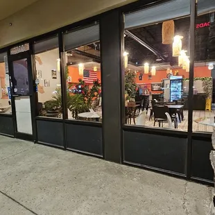 Out side of the restaurant.