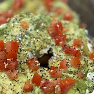 Jalapeño cheese, bagel with cream cheese, avocado, tomatoes, and everything seasoning
