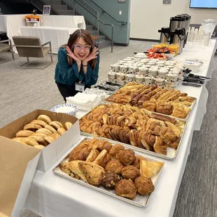 Assortment of pastries, bagels, yogurts, and fruit salad! WOW!