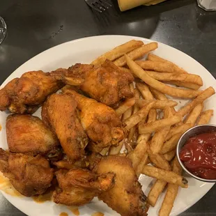 Chicken Wings and Fries.