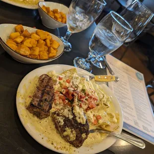 Chilaquiles poblanos.  We had potatoes in lieu of the eggs, but that filet!!  That sauce!! The queso appetizer!! Always delicious!!