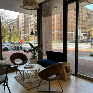 a view of a city street through a window