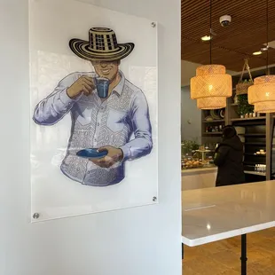 a man in a cowboy hat holding a cell phone