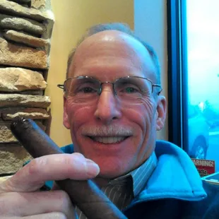 Enjoying a good stick. Friendly &amp; helpful staff to pick out a good smoke.