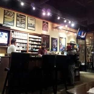 people sitting at the bar