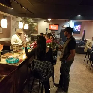 customers at the bar