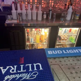 a blue bar mat with a bud light logo on it