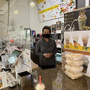 The owner in her hole in the wall counter