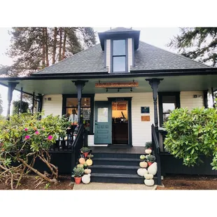 Front entrance + patio seating