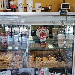 Bagels &amp; Muffins! To the left is a 3 tier stand of fruit snacks, cookies &amp; more, perfect for a quick grab &amp; go!