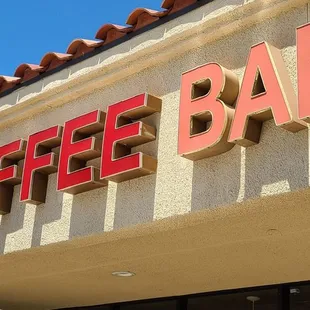 a coffee bar sign
