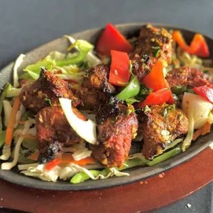 Lamb Tikka (Tandoor grilled): rich in flavor.