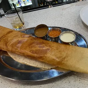 Top-tier Butter Masala Dosai. Drink glass included for scale.