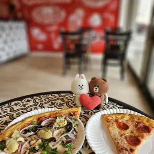 Primavera and Pepperoni pizza slices