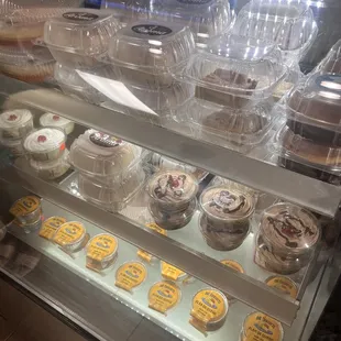 a display case of cupcakes