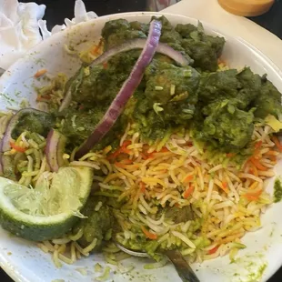 Pachi mirchi chicken biryani...perfect spice! And so good with the squeeze of lime!