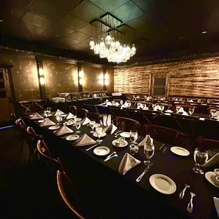 a long table with place settings