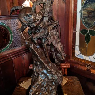 a statue of a man riding a horse