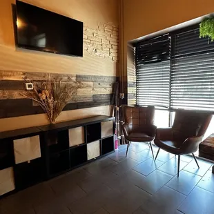 two chairs and a television