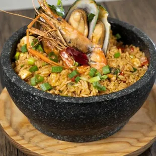 a bowl of seafood and rice