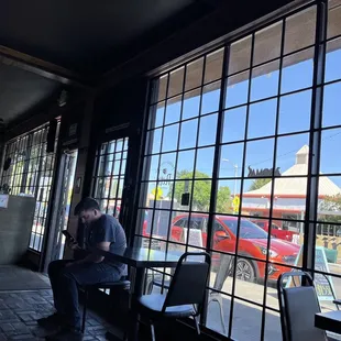 Huge windows looking out to Olive St and Tower