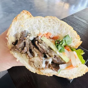 Pork bahn mi sandwich on toasted baguette. Only $8 and so tasty!
