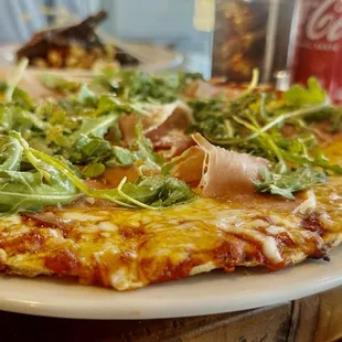 PROSICUTTO ARUGULA 18 Grilled Flatbread, Prosciutto San Daniele, Arugula, Mozzarella