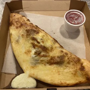 Eggplant and Italian sausage calzone.