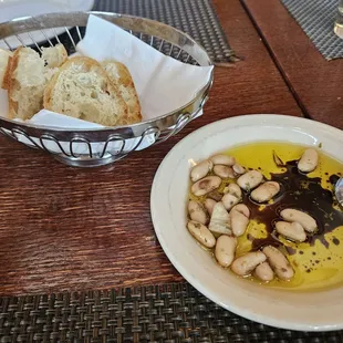 Bread and white bean in olive and balsamic vinegar on table