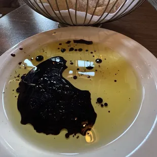 Olive oil in balsamic vinegar for fresh bread