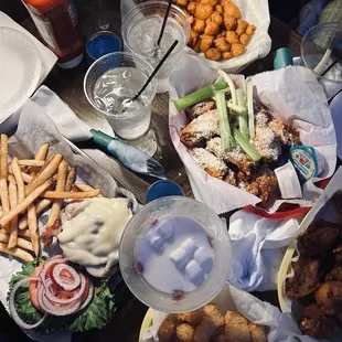 House burger, southwest tater tots, buffalo cauliflower wings, garlic parmesan wings
