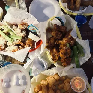 southwest tater tots, garlic parmesan wings, black pepper wings, fried pickle spears