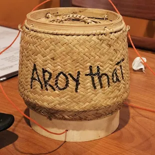 Stick rice comes in cute basket. Food was delicious.
