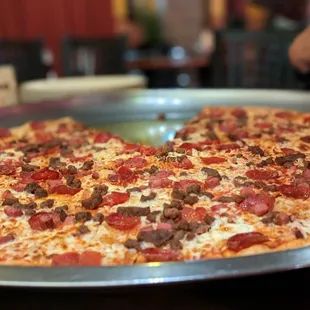 a pepperoni and sausage pizza