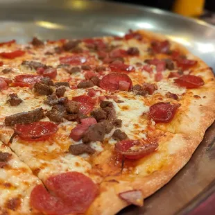 a pepperoni and sausage pizza