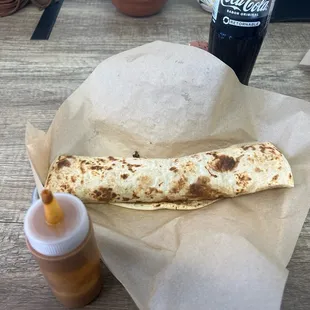 a tortilla and a drink