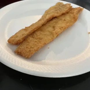 a plate of fish sticks